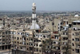 Más de 35.000 radicales y sus familiares abandonan la zona de distensión de Homs en Siria