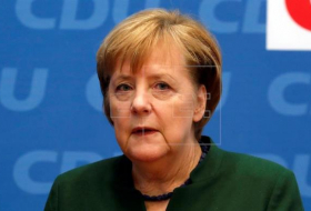 Merkel y Schulz, dispuestos a negociar una gran coalición, según los medios