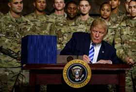 Trump firma presupuesto militar más alto de historia