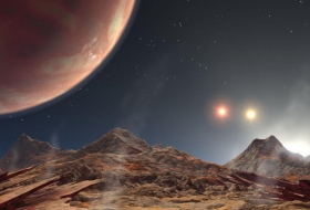Astrónomos descubren un peculiar y cercano exoplaneta con tres soles rojos brillantes