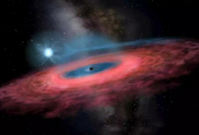 Astrónomos hallan el agujero negro más grande y cercano a Tierra