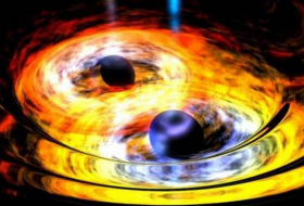 Los astrónomos descubren dos agujeros negros orbitando entre sí